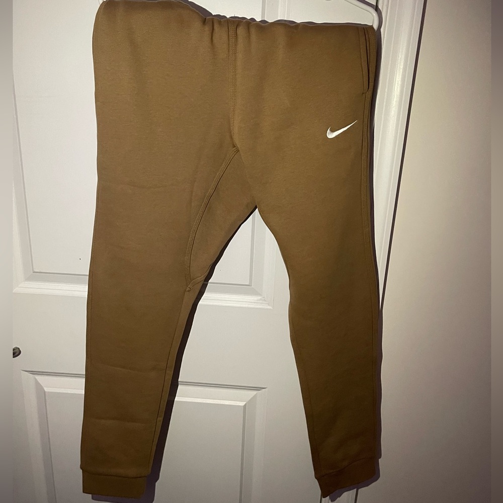 Brown nike joggers size small